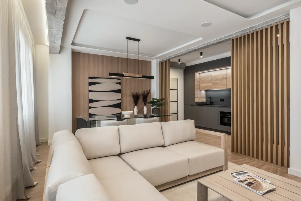 Vivienda SB5: salón luminoso con sofá beige
